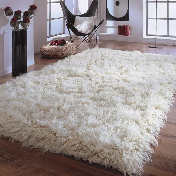 White, long-fiber shaggy Flokati area rug.