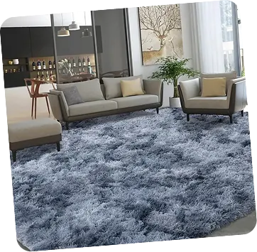 Plush blue-grey shaggy rug in a modern living room.