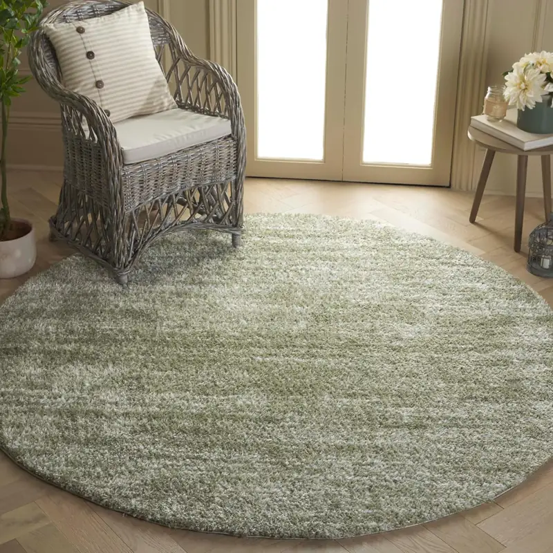 Round green shaggy rug near a wicker chair