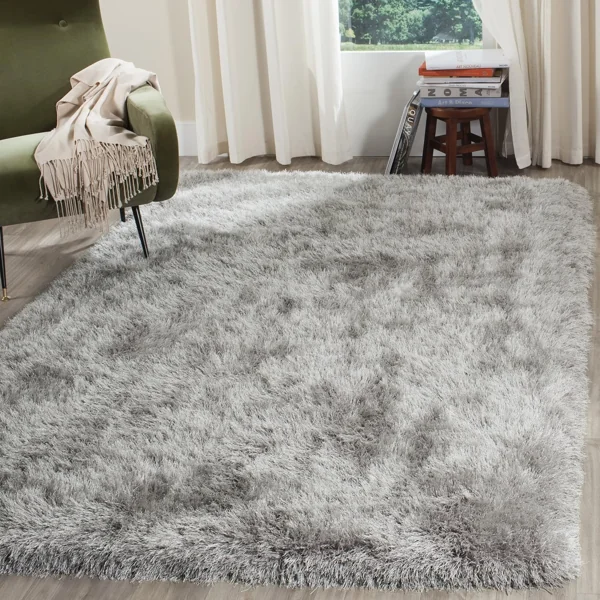 Shiny grey silk-texture shaggy rug.