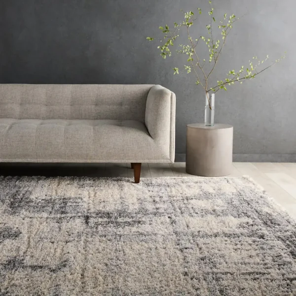 Grey and white patterned shaggy area rug